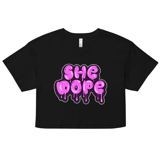 "She Dope" women’s crop top